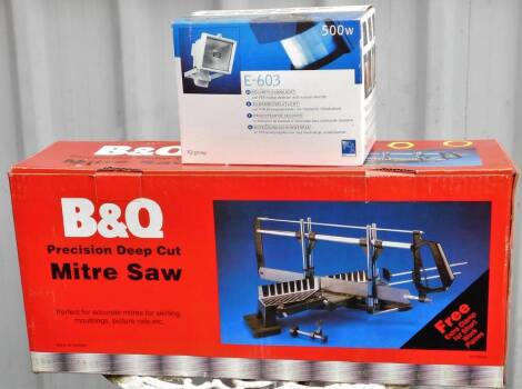 A B&Q precision deep cut mitre saw and a flood light. (2 boxed)