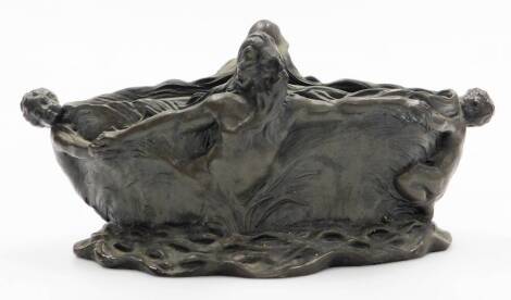 An Art Nouveau style bronze bowl, depicting group of figures intertwined, 32cm wide, on a cushioned base.