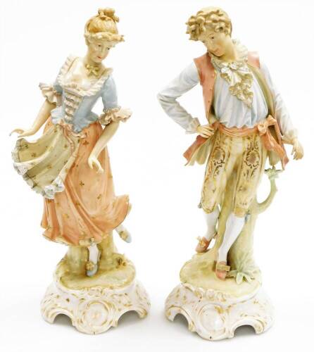 A pair of late 19thC Continental porcelain figures, a lady and gentleman, each on a shaped base, blue painted anchor beneath, 47cm high.