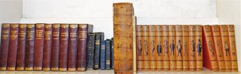 A group of leather bound and other books, to include a Dickens series, various, leather bound Holy Bibles, and Common Prayer books, England's Greater Churches hardback book and a part set of Punch - Library of Humour. (1 shelf)