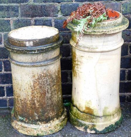 Two stoneware chimney pots, each of tapered design, one 53cm high, the other 56cm high. (2)