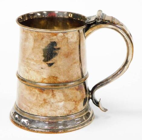 An 18thC old Sheffield plate tankard, lacking lid, stamped N Smith and Co 1784, 15cm high. (AF)