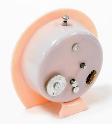 A Metalair Art Deco style clock, with a silver coloured face, in pink Bakelite surround, 16cm high, 15cm wide. - 3