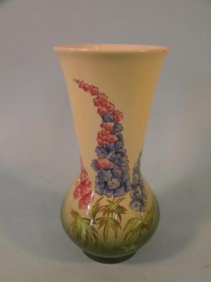 A Royal Winton vase decorated with wall flowers