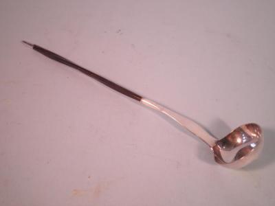 A 19thC small silver sauce ladle with whale bone hande