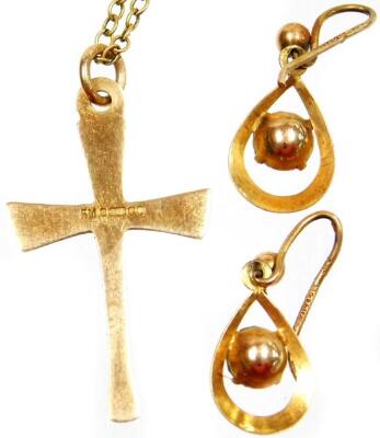 A 9ct gold crucifix pendant and chain, the pendant with inner marked cross on shaped ends, on a fine link chain, 2.2g, together with a pair of 9ct gold drop earrings, each stone set. (2) - 2