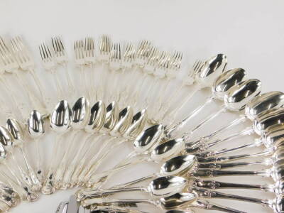 An associated canteen of 19thC and later silver Kings pattern cutlery, comprising an set of twelve dessert spoons, London 1818 by Josiah and George Piercy (22½oz), a set of twelve table forks, London 1823, possibly by William Stroud, (38oz), a set of twel - 3