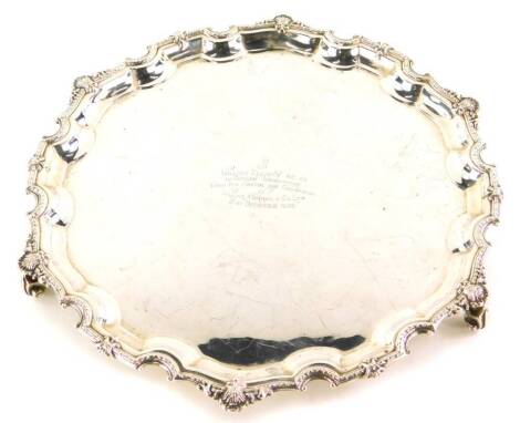 An Elizabeth II silver salver, the shaped piecrust border cast with shells, etc., engraved to the centre, William Elliott M.C, C.A in sincere appreciation from his friends and colleagues in William Murray and Co Limited, 21st December 1965, Birmingham 196