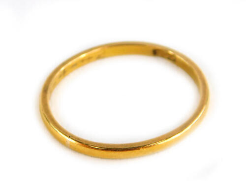 A 22ct gold thin wedding band, 1.6g.