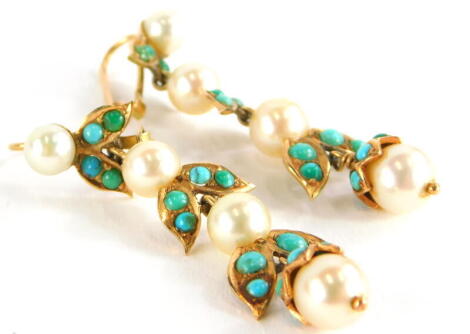 A pair of turquoise and pearl earrings, each of three tier design, with cultured pearl, in yellow metal frame, unmarked, 4cm high, 7.7g all in.