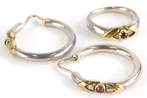 A ring and earring set, the ring on white metal band with yellow metal V shoulders and a central garnet in rub over setting, unmarked, possibly white and yellow gold, ring size I½, 14.3g all in.