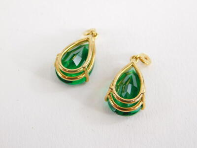 A pair of green paste stone earring drops, in gold plated frame with single loop to top. - 2