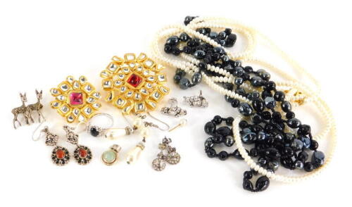 A group of costume jewellery, to include faux pearl necklace, two gold plated and paste stone set brooches, silver and other earrings and dress rings, paste stone set floral earrings, marcasite two deer brooch, etc. (a quantity)