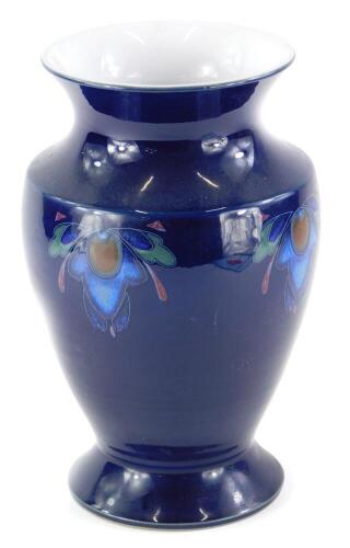 A Denby vase, decorated with Art Nouveau motifs on a cobalt blue ground, printed marks to underside, 26cm high.