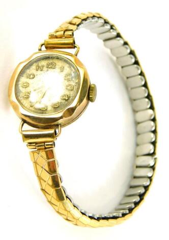 A 9ct gold cased ladies wristwatch, with Bentima star jewel movement, on a later expanding gold plated strap, the dial 1.5cm wide.