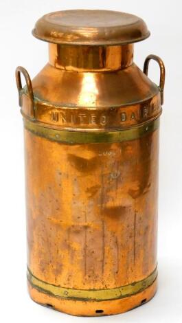 A United Dairies copper two handled milk churn, stamped Trowbridge, etc., 73cm high.