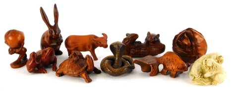 A quantity of modern carved wood netsuke, and a resin example.