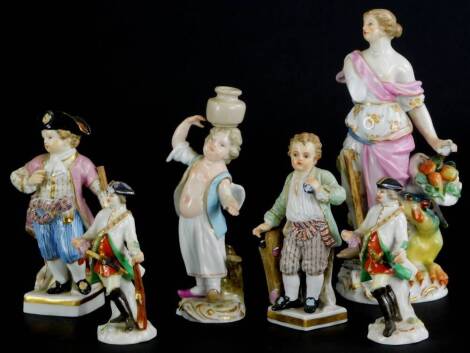 A collection of Meissen and Dresden figures, to include a figure with a dragon, a candlestick, a pair of footman type figures, etc., all bearing blue cross swords mark to underside. (AF), (6)