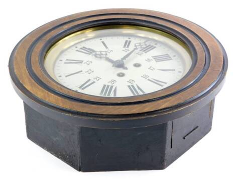 A continental wall clock, the painted dial with Roman numerals and subsidiary numbers from thirteen to twenty four, in a stained ebonised beech case, 38cm diameter.