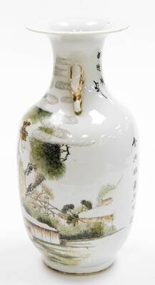 A 20thC Chinese porcelain vase, decorated in enamels with Shao Lao and his gnarled staff, surrounded by trees, with gilt elephant handles and calligraphy to the back, drilled, 35cm high. - 4