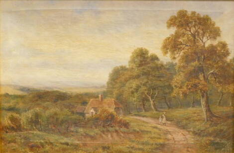 J.S.J. (19thC English School). Figures on a path before cottage and trees on a summer's day, oil on canvas, monogrammed, 30cm x 43cm.