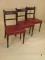 A set of three early 19thC mahogany dining chairs with a rope back