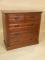 A late Victorian walnut chest of two short and three long drawers