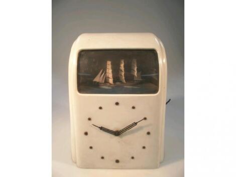 A 1930's Vitascope, electric automaton clock with 'rocking ship' movement,