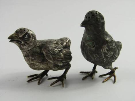 A pair of George V silver novelty pepperettes, modelled as birds, Sheffield 1927, 4.07t oz.