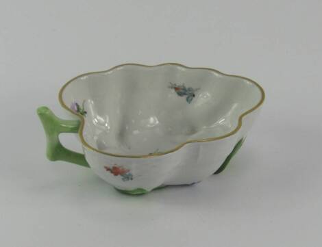 A Herend Porcelain leaf shaped pickle dish, moulded and painted with flowers, printed mark, 10.5cm long.