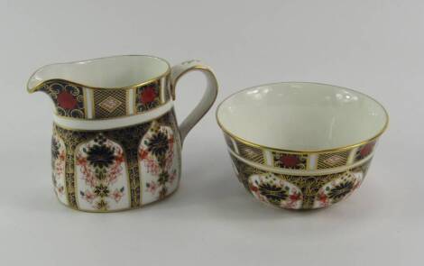 A Royal Crown Derby porcelain Old Imari cream jug, and sugar bowl, 1983 and 1980 respectively, printed marks, jug a second.