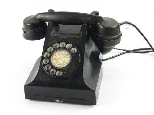 An AEF black cased telephone, dial for Weston.