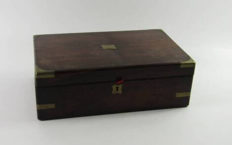 A Victorian rosewood and brass bound writing slope, with brass escutcheons, 35cm x 22.5cm x 11.5cm.