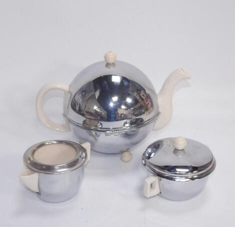 A Kosycraft Heatmaster Easiclean, pottery and chrome mounted three piece tea set.