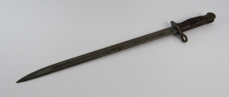 A US Remington WWI bayonet, dated 1917, impressed marks, 55cm long.