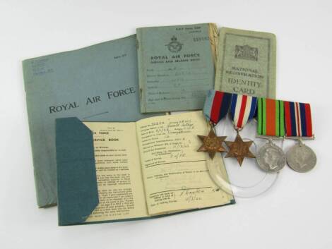 A WWII group of medals, to MTM LA G A Lewis, comprising 1939-45 Star, France and Germany Star, Defence and War medals, together with his service book, service and pay book, identity card, empty notebook.