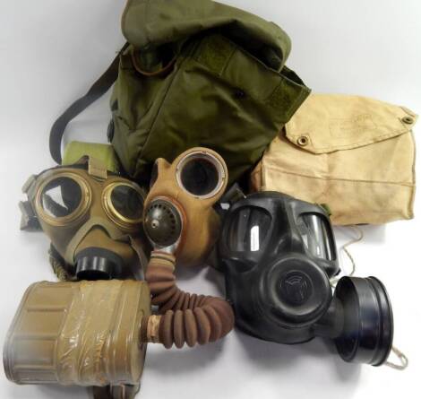 WWII and later gas masks, bagged, (9).