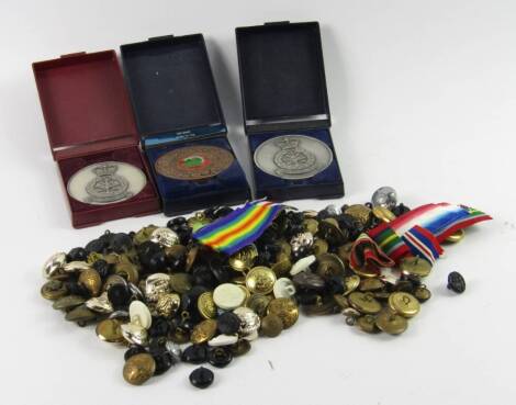 Military regimental buttons, together with medal ribbons, two British Forces Cyprus sporting medals 'Winners Inter Service Cross-Country 1988/89' and 'Athletics 1989 Winners', and a copper East Anglian Cross-Country League RAF medal, all boxed, (a quantit