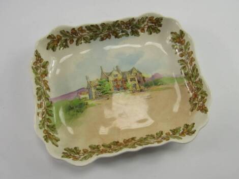 A Royal Doulton pottery dish, decorated with The Peacock, Rowsley from The Old English Inns Series D6072, printed marks, 20cm x 23cm.