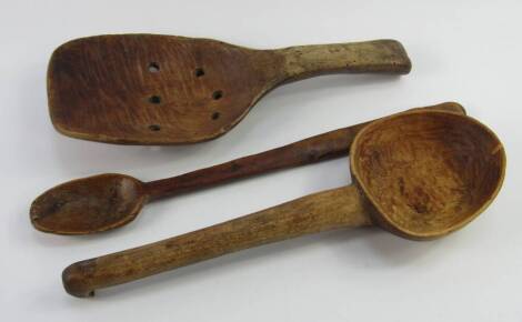 Three rustic carved domestic wooden spoons.