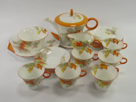 A Shelley porcelain part tea service, decorated in the Cape Gooseberry pattern, printed and painted marks, comprising teapot, cream jug, sugar bowl, bread plate, six cups, saucers and plates, (24).