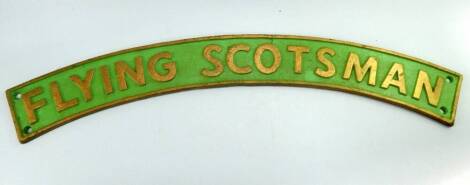 A cast metal plaque marked 'Flying Scotsman', 90cm wide.