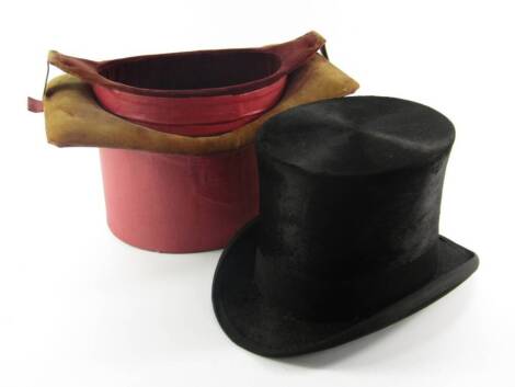 A Lincoln Bennett & Co black top hat, brushed silk in a hat shaped, velvet lined box, 8" x 6 1/4"