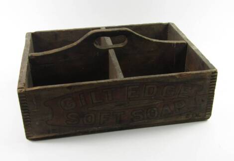 A wooden display box for Gilt Edge Soft Soap, of rectangular four section form with central carrying handle, 44.5cm x 33cm.