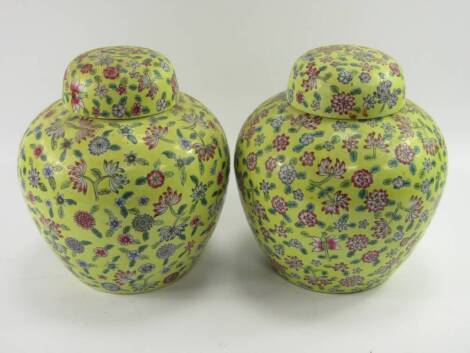 A pair of Republic period yellow brown Chinese ginger jars, decorated in enamels, 28cm high.