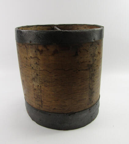 A 19thC Bushell measuring cylinder, 30cm diameter.