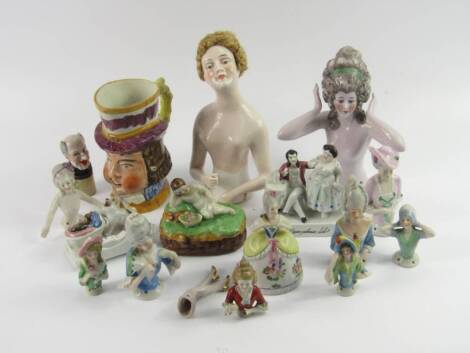 Porcelain pin cushion dolls, a fairing 'If you Please, Sir', box and cover, novelty figural bottle stopper and a pottery jug, (a quantity).