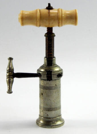 A Victorian Kings type corkscrew, with a white metal barrel and turned ivory handle, 18cm long.