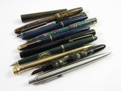 Fountain pens, including a Parker Vacumatic, Watermans striated pen and a Mabie Todd black swan pen, ball point pens and an Eversharp gold plated propelling pencil, (a quantity).