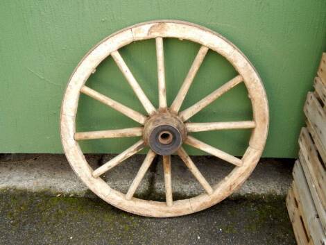 A farm cart wheel, 86cm diameter.